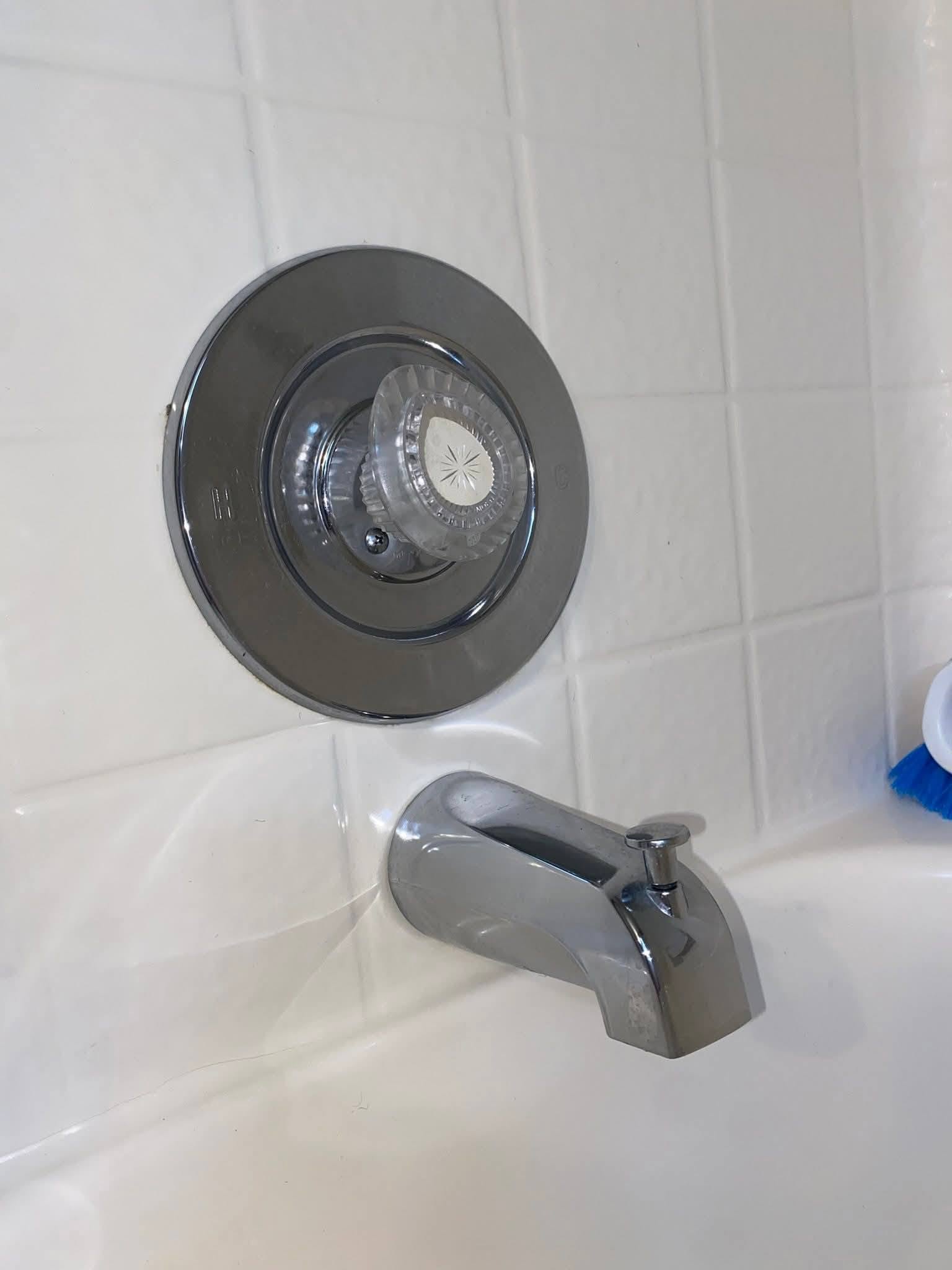 A bathtub spout polished clean